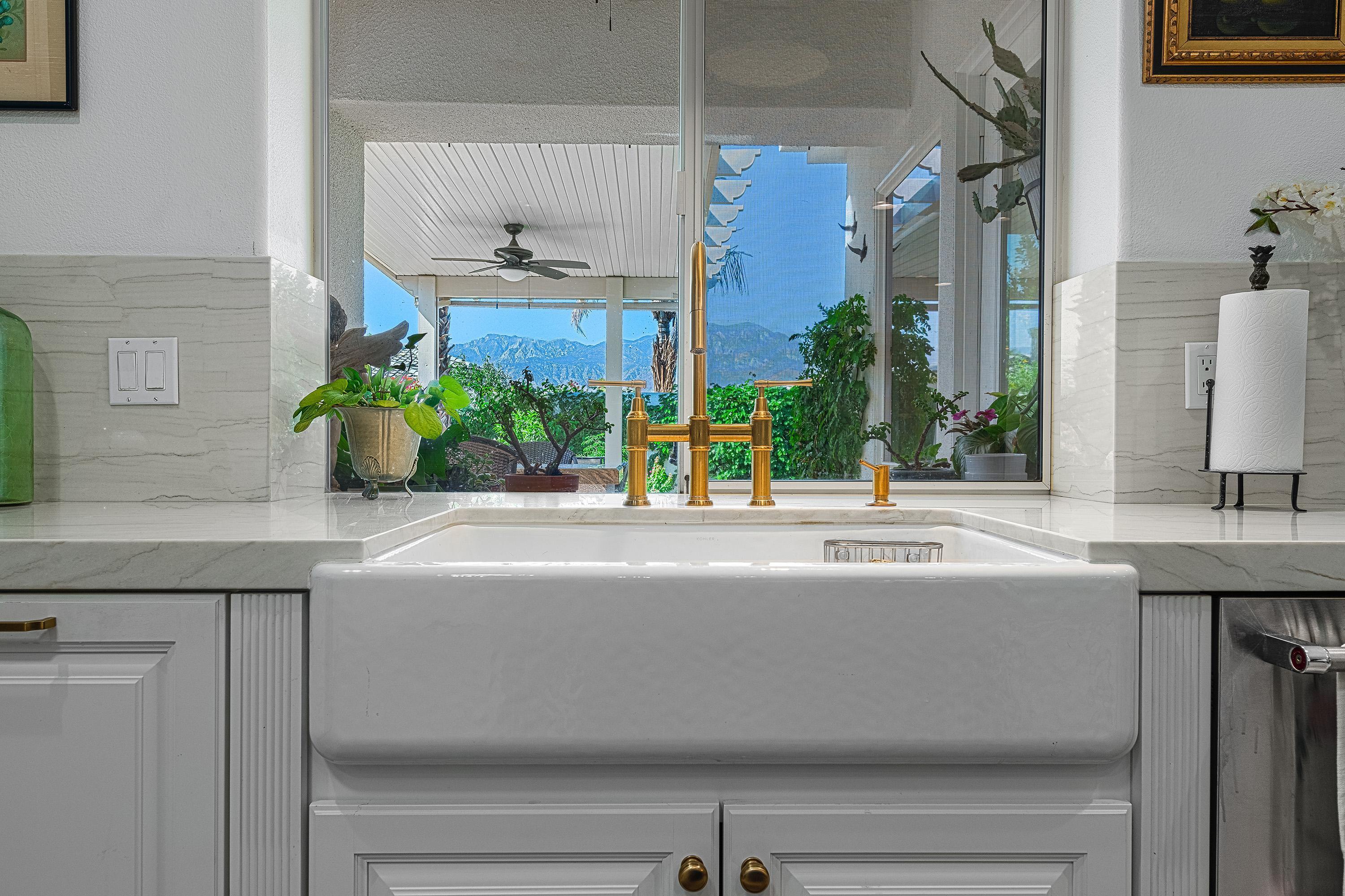 3 Trafalgar Rancho Mirage, CA 92270 - Photo 15 of 42 a close view of sink and mirror