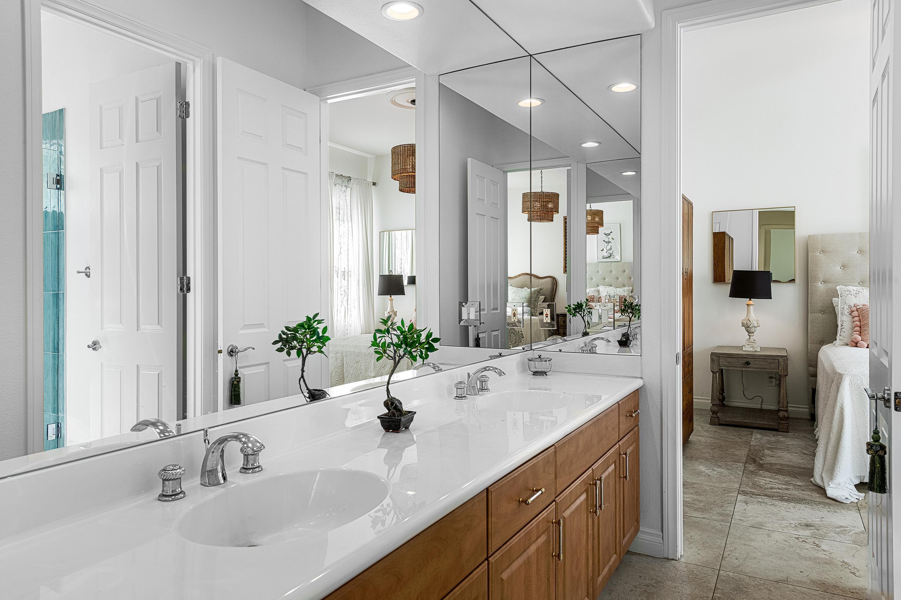 3 Trafalgar Rancho Mirage, CA 92270 - Photo 35 of 42 a bathroom with a double vanity sink mirror and shower