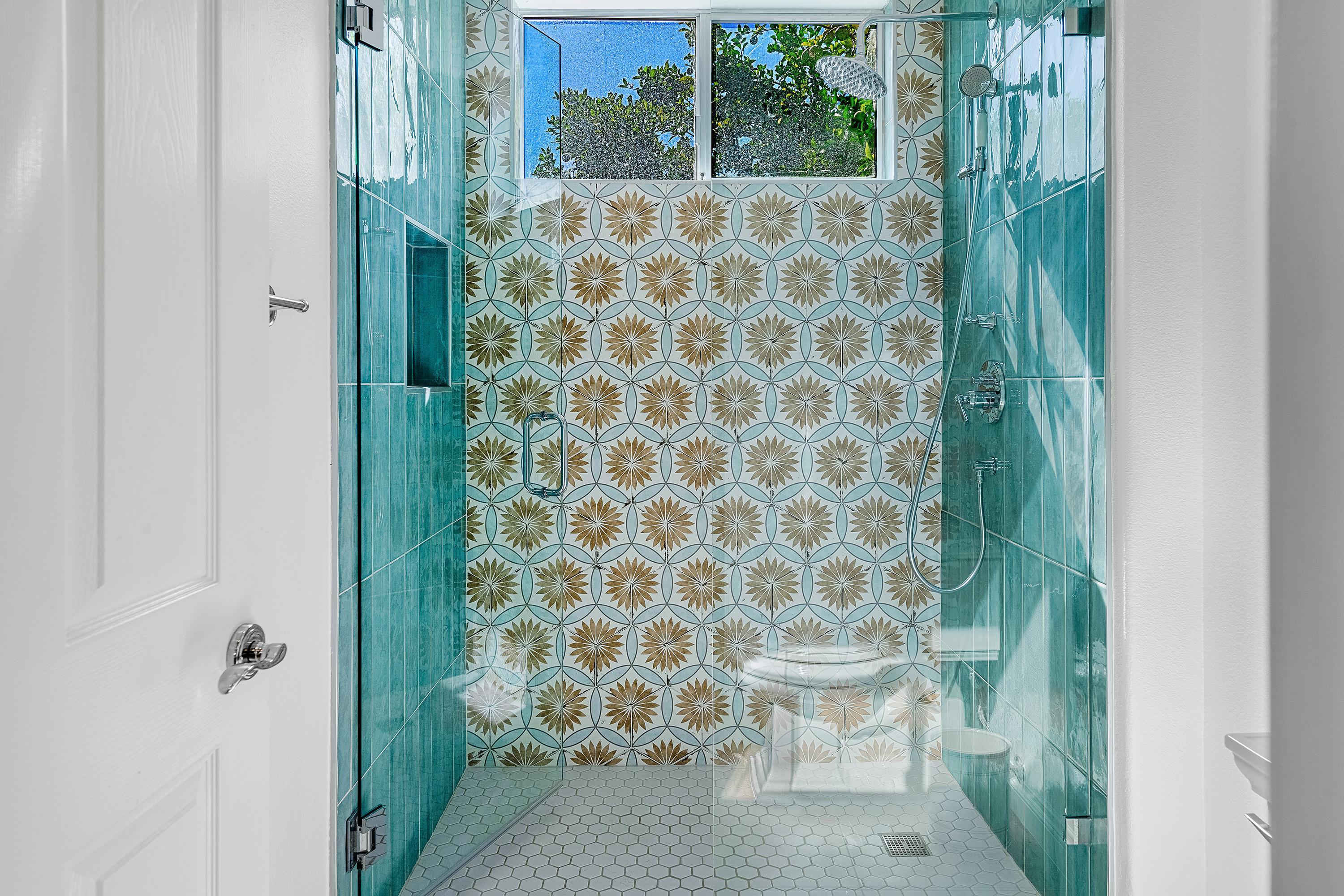 3 Trafalgar Rancho Mirage, CA 92270 - Photo 36 of 42 a bathroom with a toilet and a shower curtain