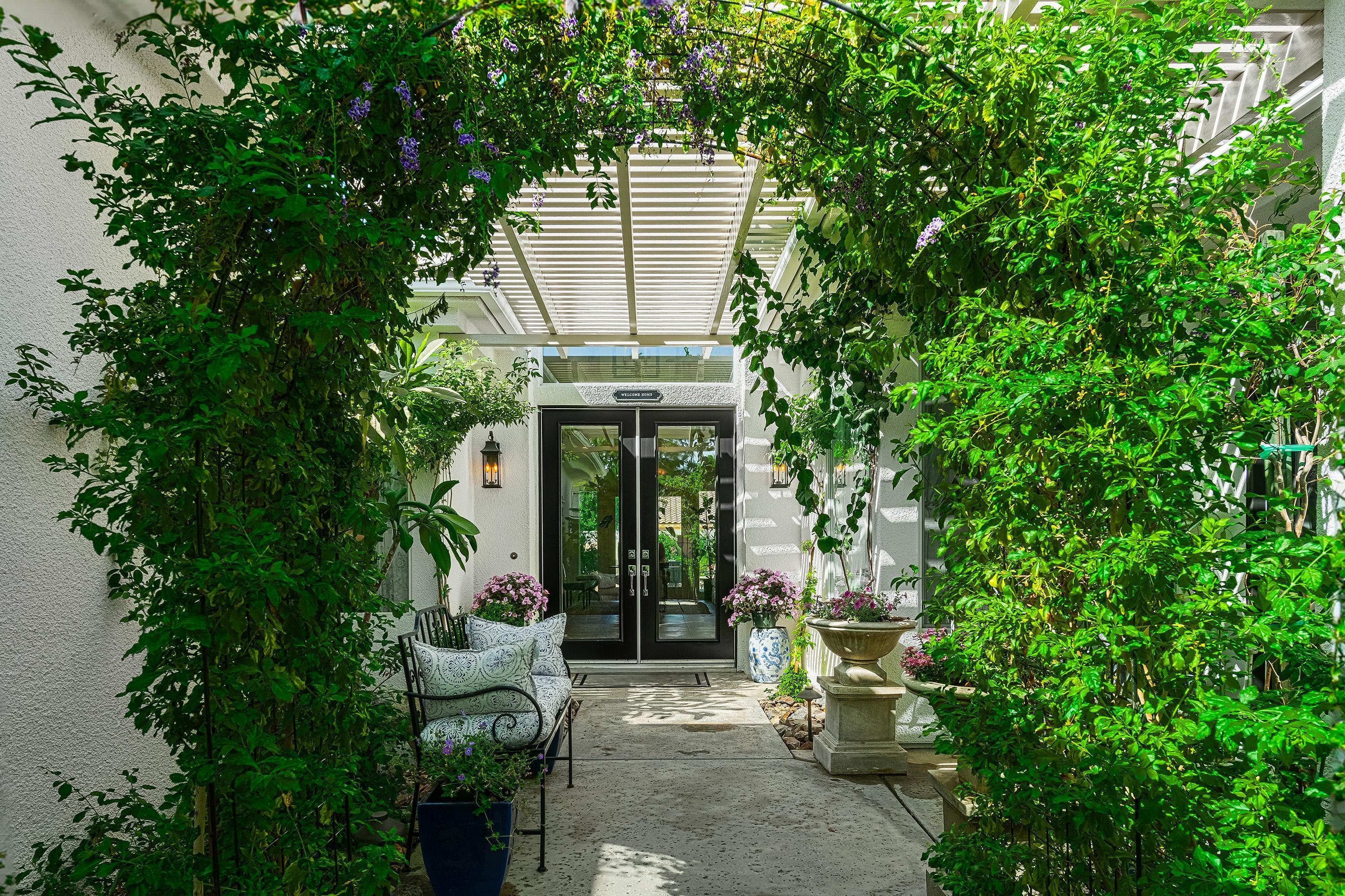 3 Trafalgar Rancho Mirage, CA 92270 - Photo 4 of 42 an outdoor view of garden with patio