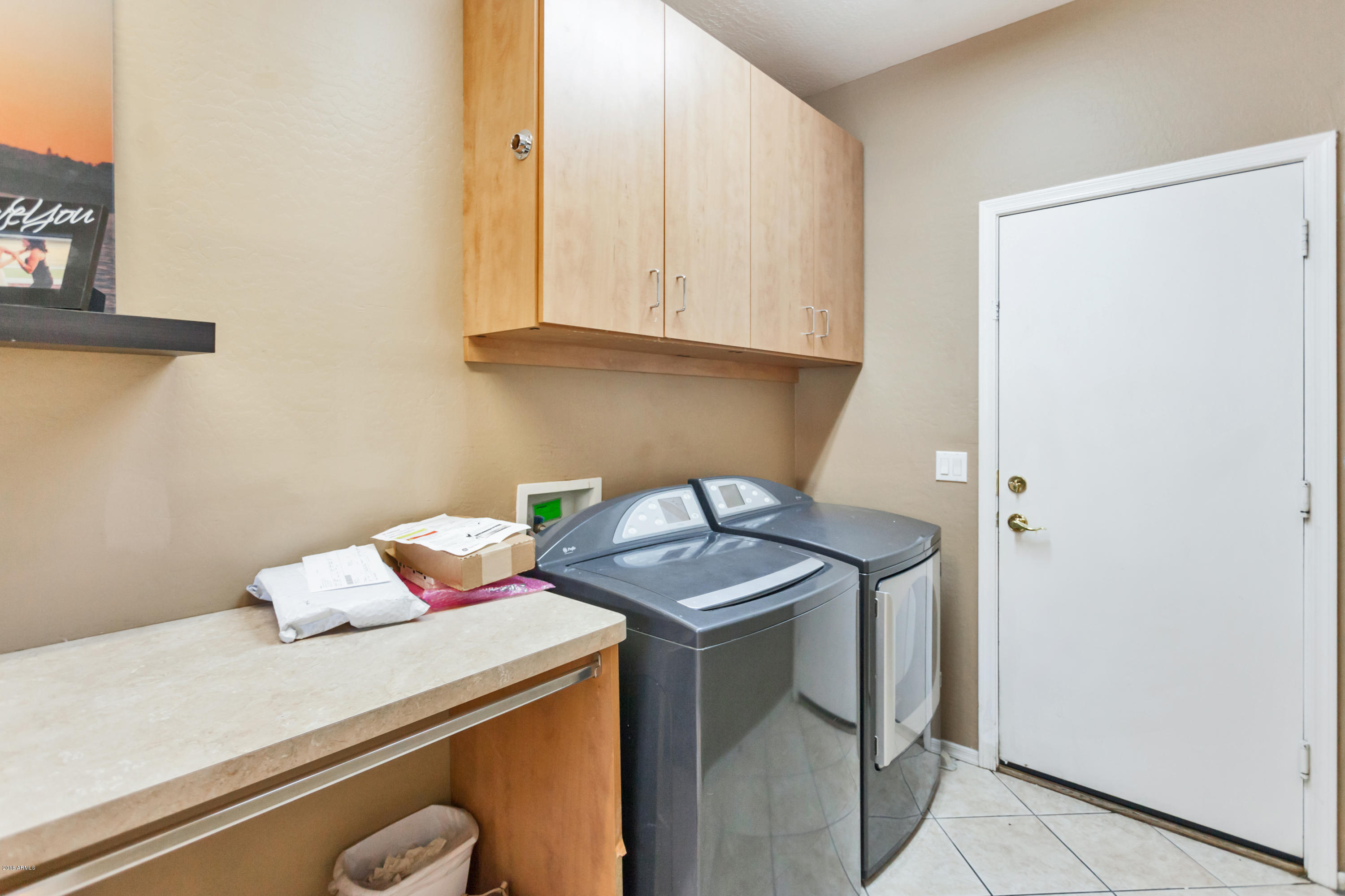 13558 West Calavar Road Surprise, AZ 85379 - Photo 25 of 31 a utility room with dryer and washer