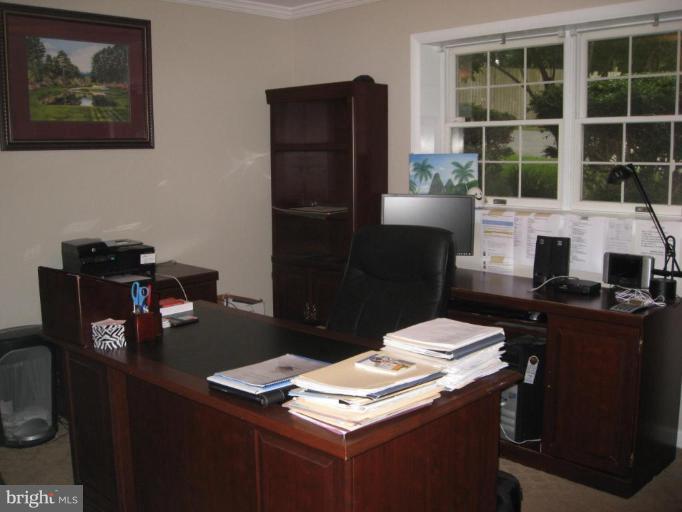 5345 Huntingtown Road Huntingtown, MD 20639 - Photo 11 of 12 a work place with table and chairs