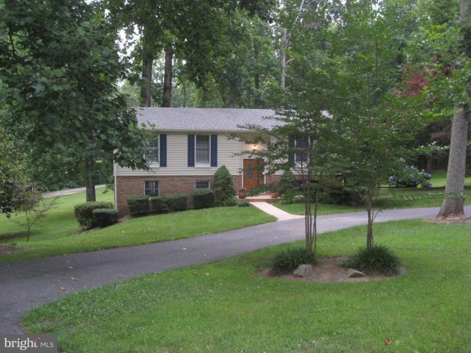 5345 Huntingtown Road Huntingtown, MD 20639 - Photo 6 of 12 a view of a house with a yard