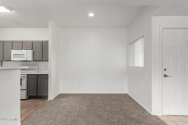 a view of kitchen and hallway
