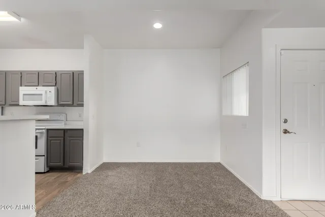 a view of kitchen and hallway