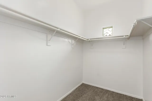 a view of a room with racks on the wall