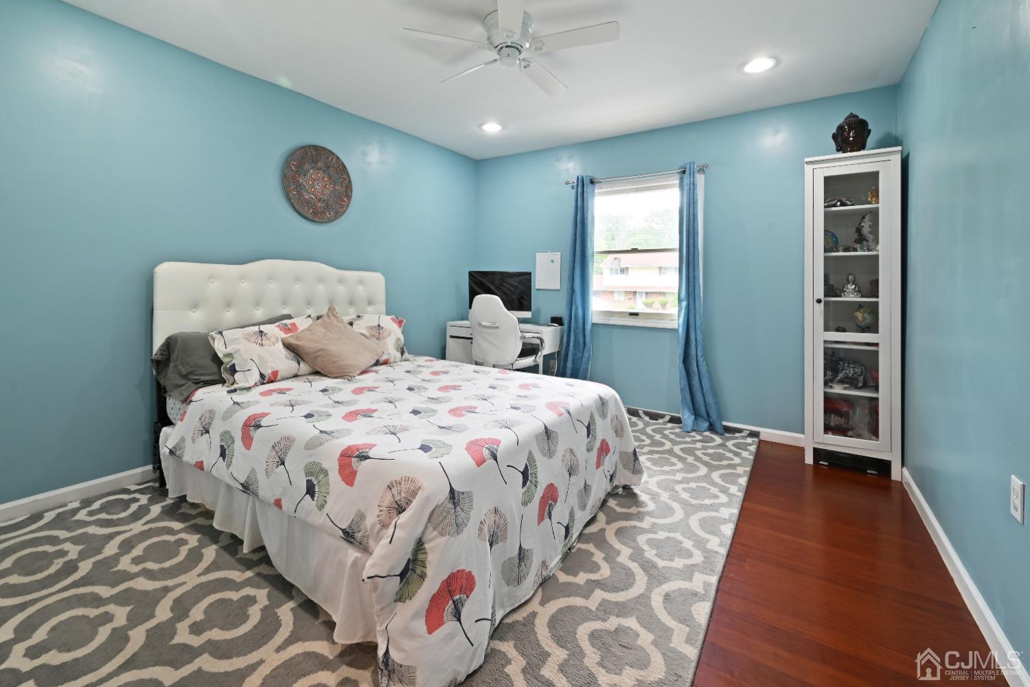 6 Calvin Road Kendall Park, NJ 08824 - Photo 17 of 30 a bedroom with a bed and a window