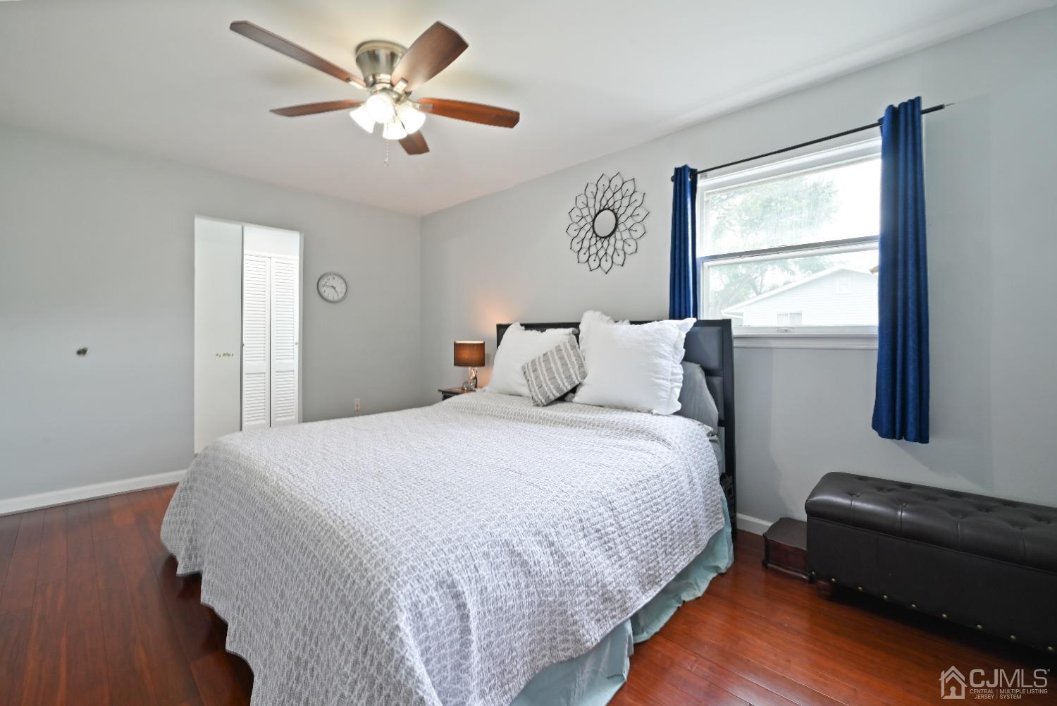 6 Calvin Road Kendall Park, NJ 08824 - Photo 20 of 30 a bedroom with a bed and a window