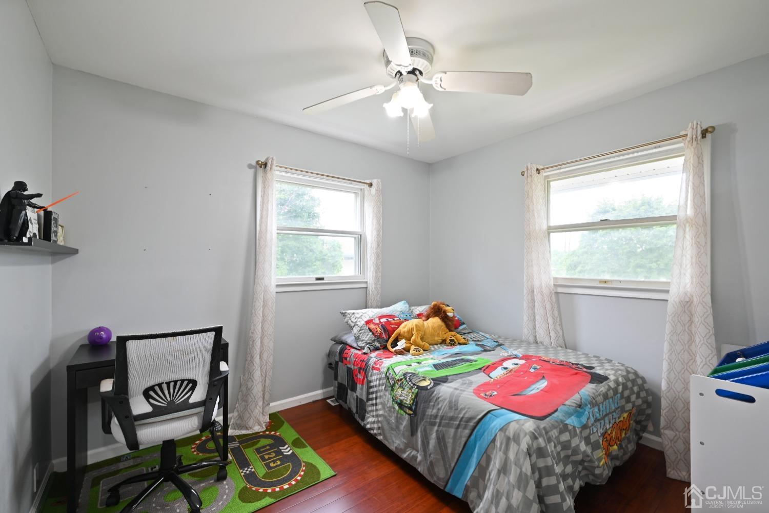 6 Calvin Road Kendall Park, NJ 08824 - Photo 21 of 30 a bedroom with a bed and a window