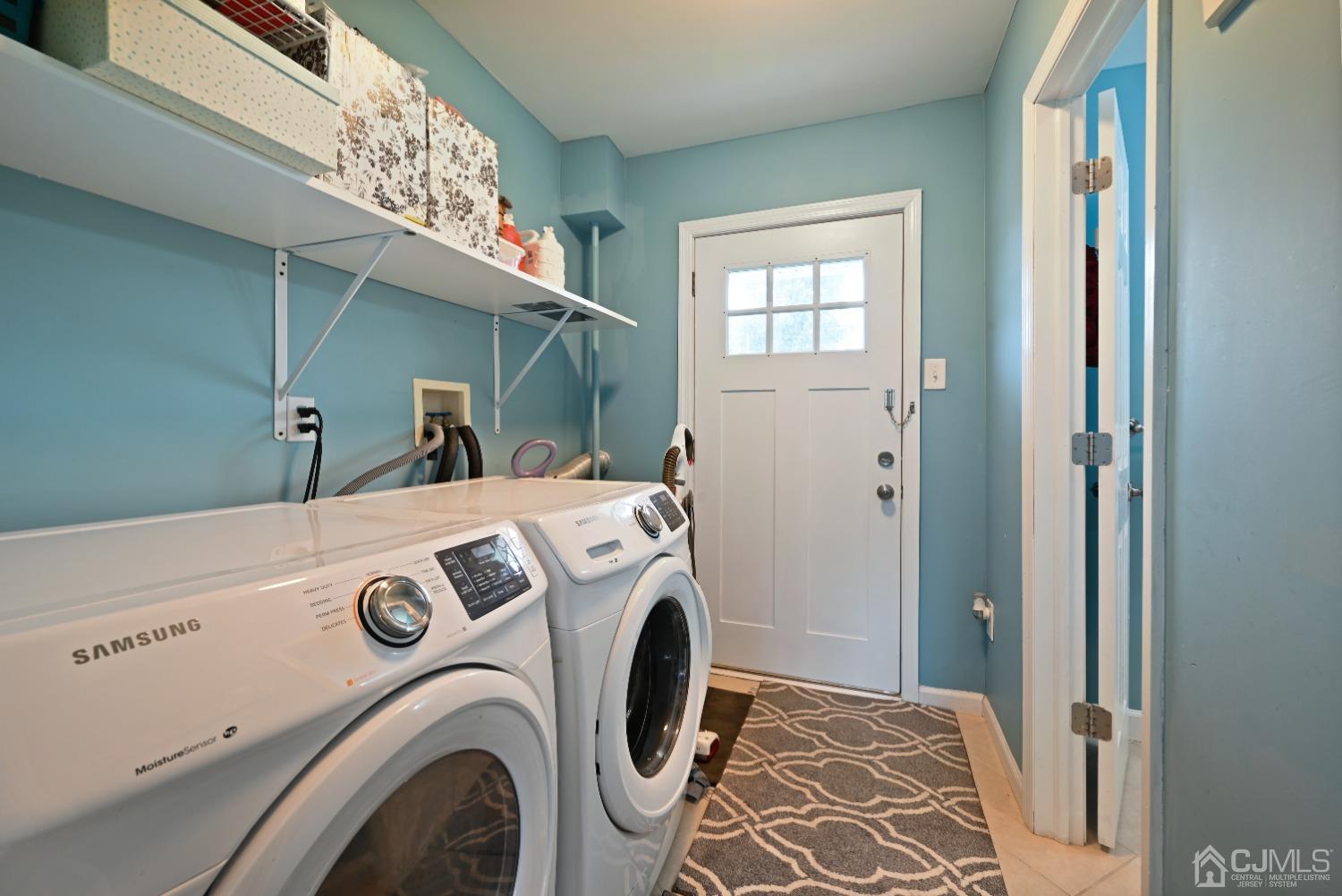 6 Calvin Road Kendall Park, NJ 08824 - Photo 26 of 30 a utility room with dryer and washer