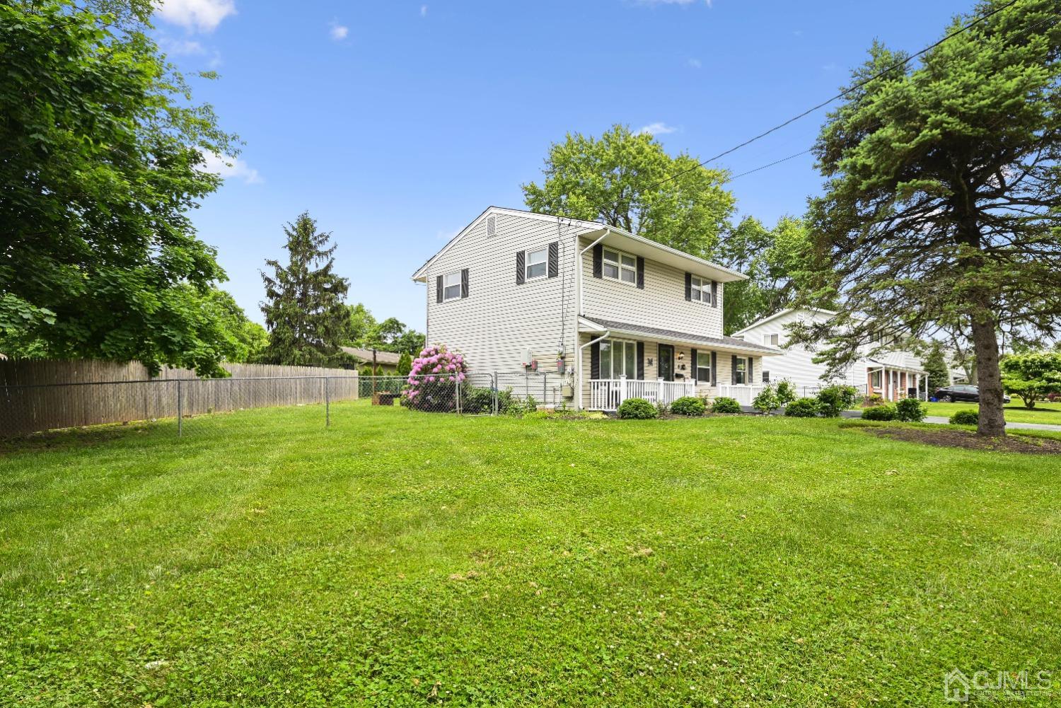 6 Calvin Road Kendall Park, NJ 08824 - Photo 30 of 30 a view of a house with a big yard