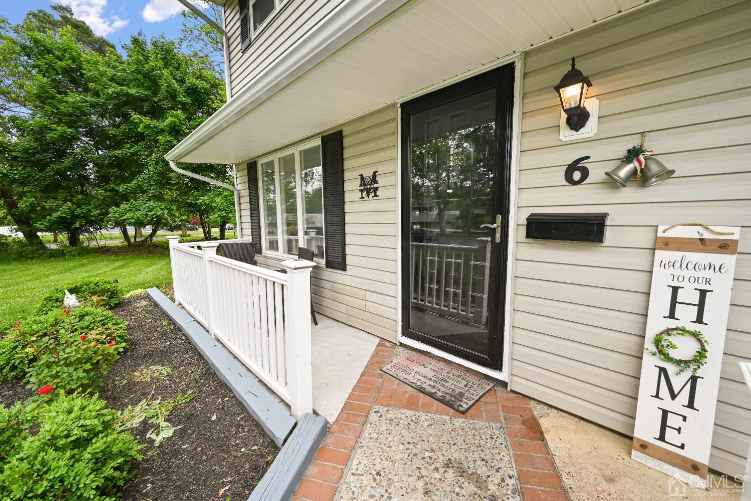 6 Calvin Road Kendall Park, NJ 08824 - Photo 4 of 30 a view of a corridor