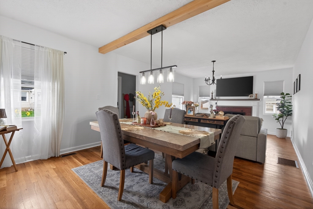 37 Blakely Court Fall River, MA 02720 - Photo 11 of 19 a view of a dining room with furniture window and wooden floor