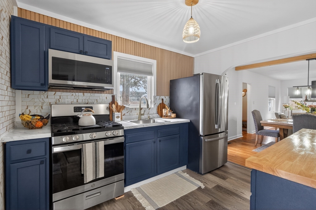37 Blakely Court Fall River, MA 02720 - Photo 14 of 19 a kitchen with stainless steel appliances granite countertop a stove refrigerator and microwave