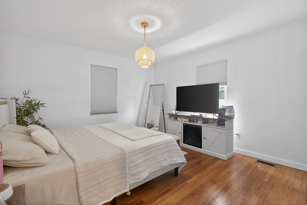 37 Blakely Court Fall River, MA 02720 - Photo 15 of 19 a bedroom with a bed and a flat screen tv