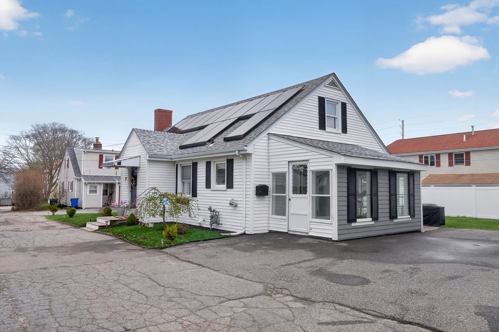 37 Blakely Court Fall River, MA 02720 - Photo 3 of 19 a front view of a house with a yard