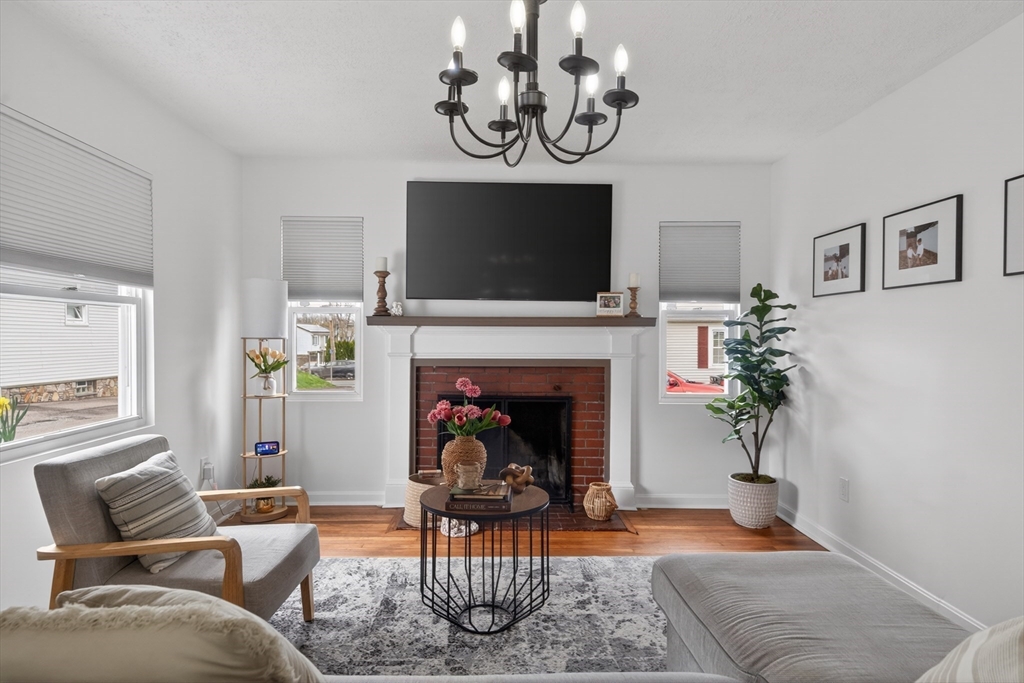 37 Blakely Court Fall River, MA 02720 - Photo 8 of 19 a living room with furniture and a fireplace