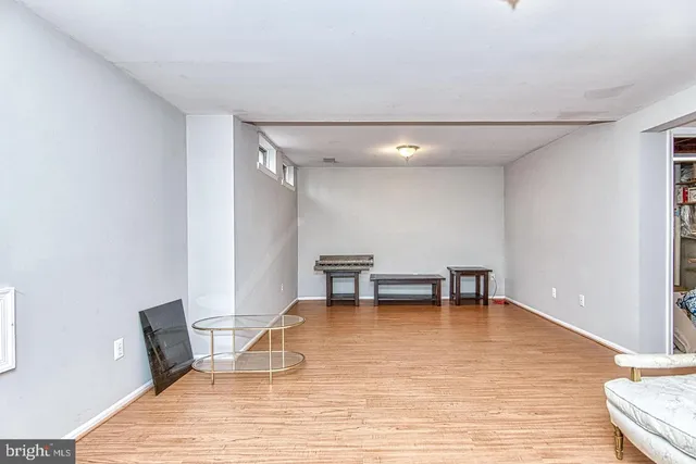 a view of storage and utility room with washer and dryer