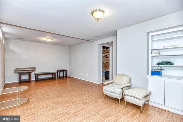 a view of a roof deck with furniture