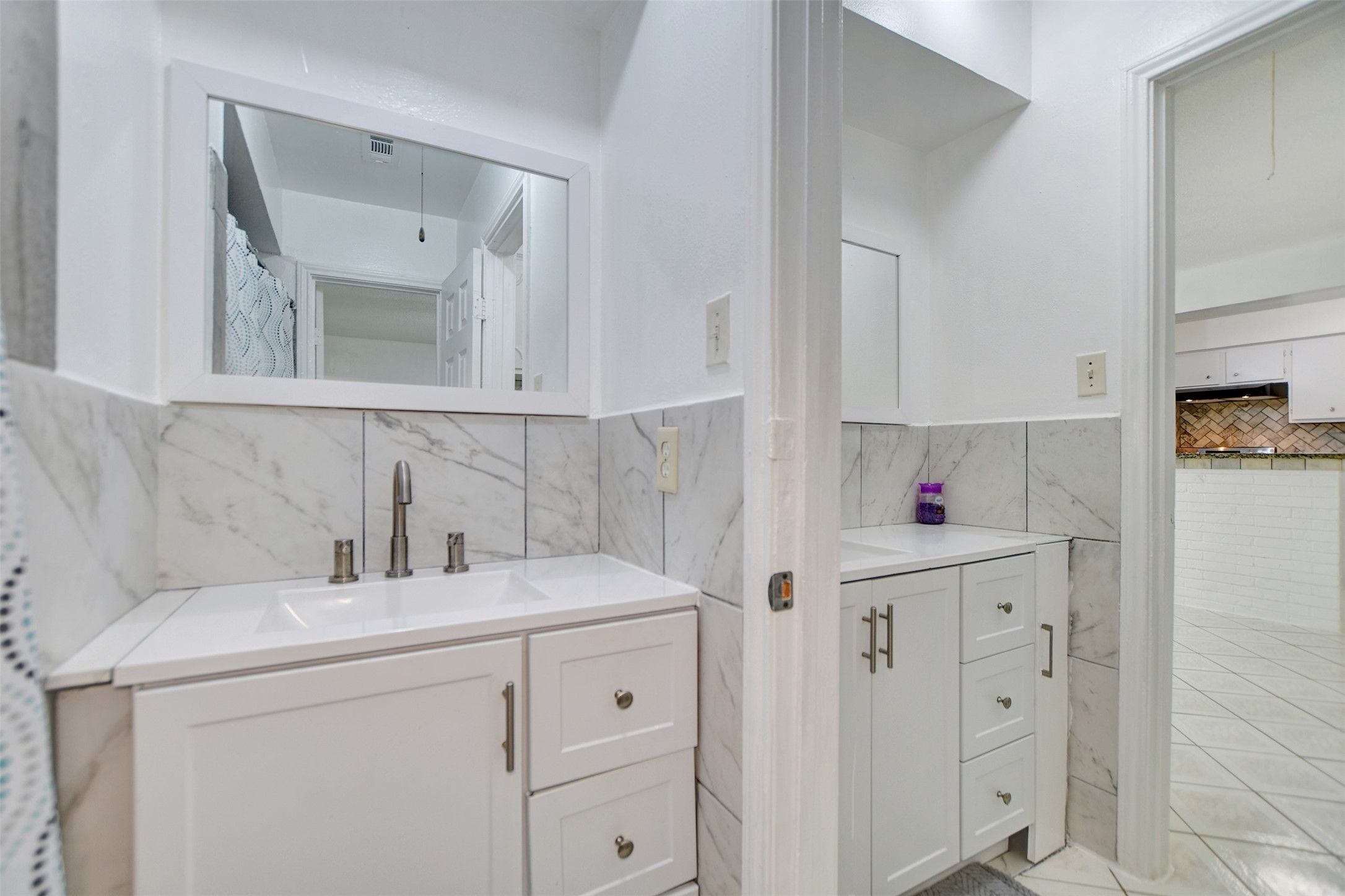 9436 Neuens Road, Unit 9436 Houston, TX 77080 - Photo 12 of 17 double sinks for primary bedroom and guest