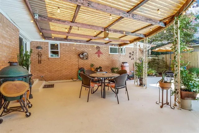 a dining room with furniture and a table