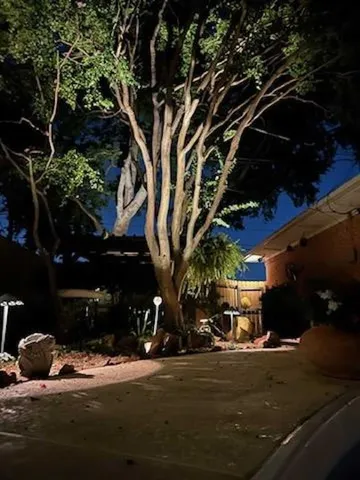 a view of street with parked cars