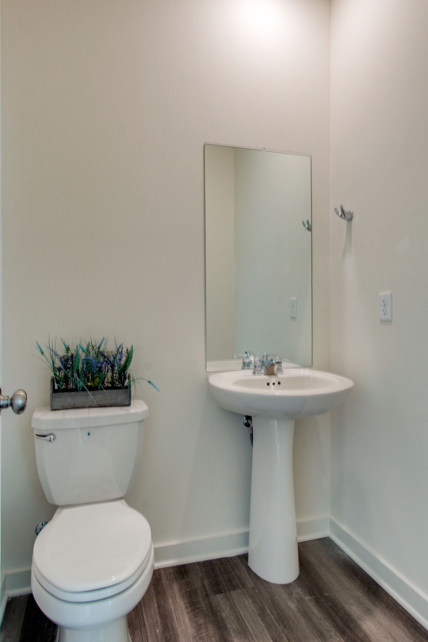 1703 Frodo Way Murfreesboro, TN 37128 - Photo 11 of 25 a bathroom with a toilet sink and mirror