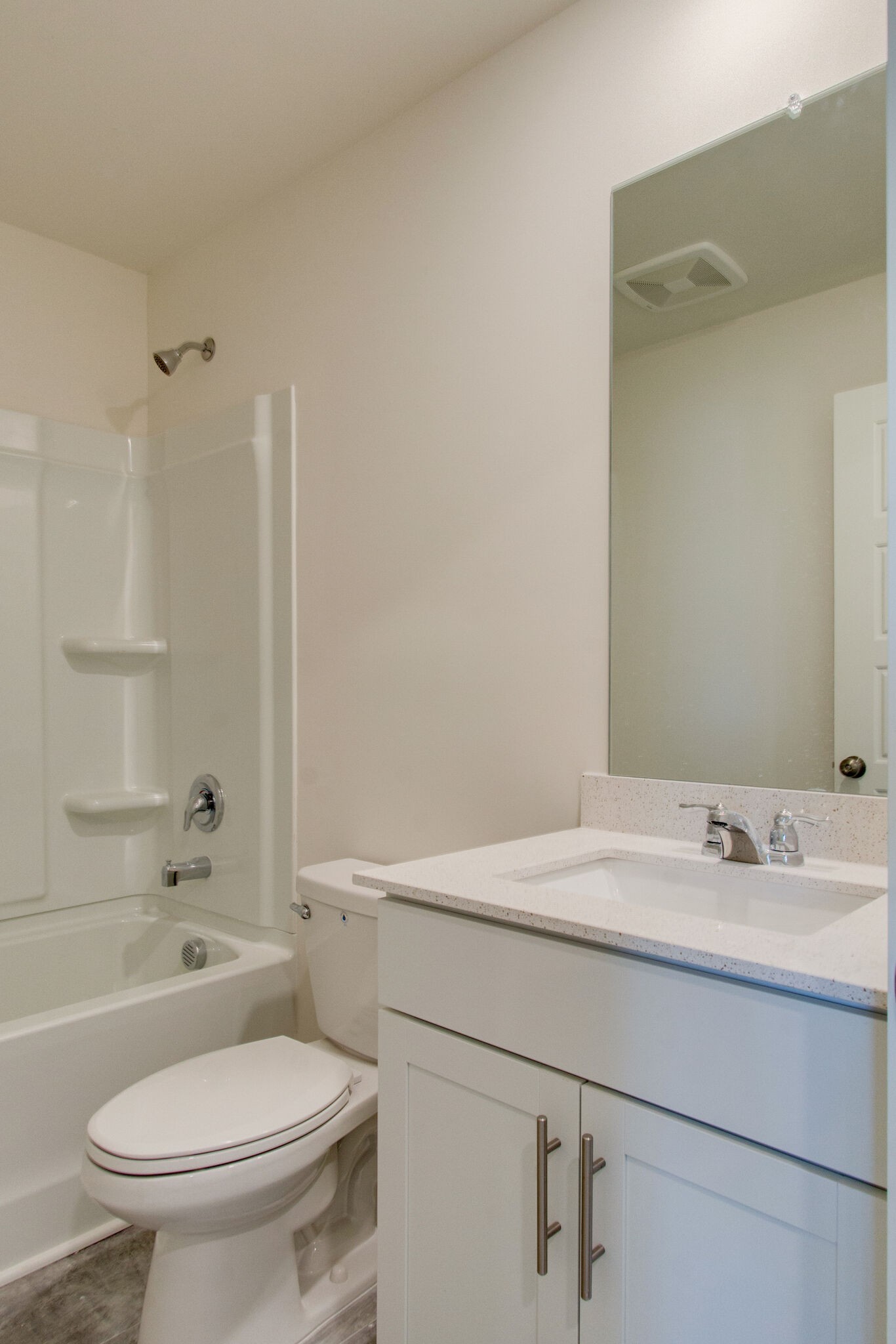 1703 Frodo Way Murfreesboro, TN 37128 - Photo 21 of 25 a bathroom with a sink toilet vanity and shower