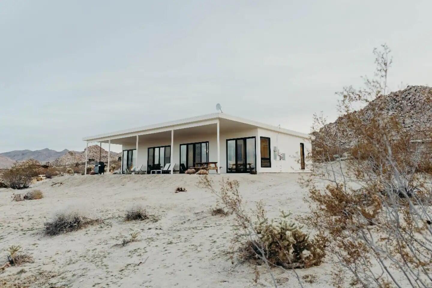 63730 Hollinger Road Joshua Tree, CA 92252 - Photo 4 of 31 a view of a house with a yard covered in snow