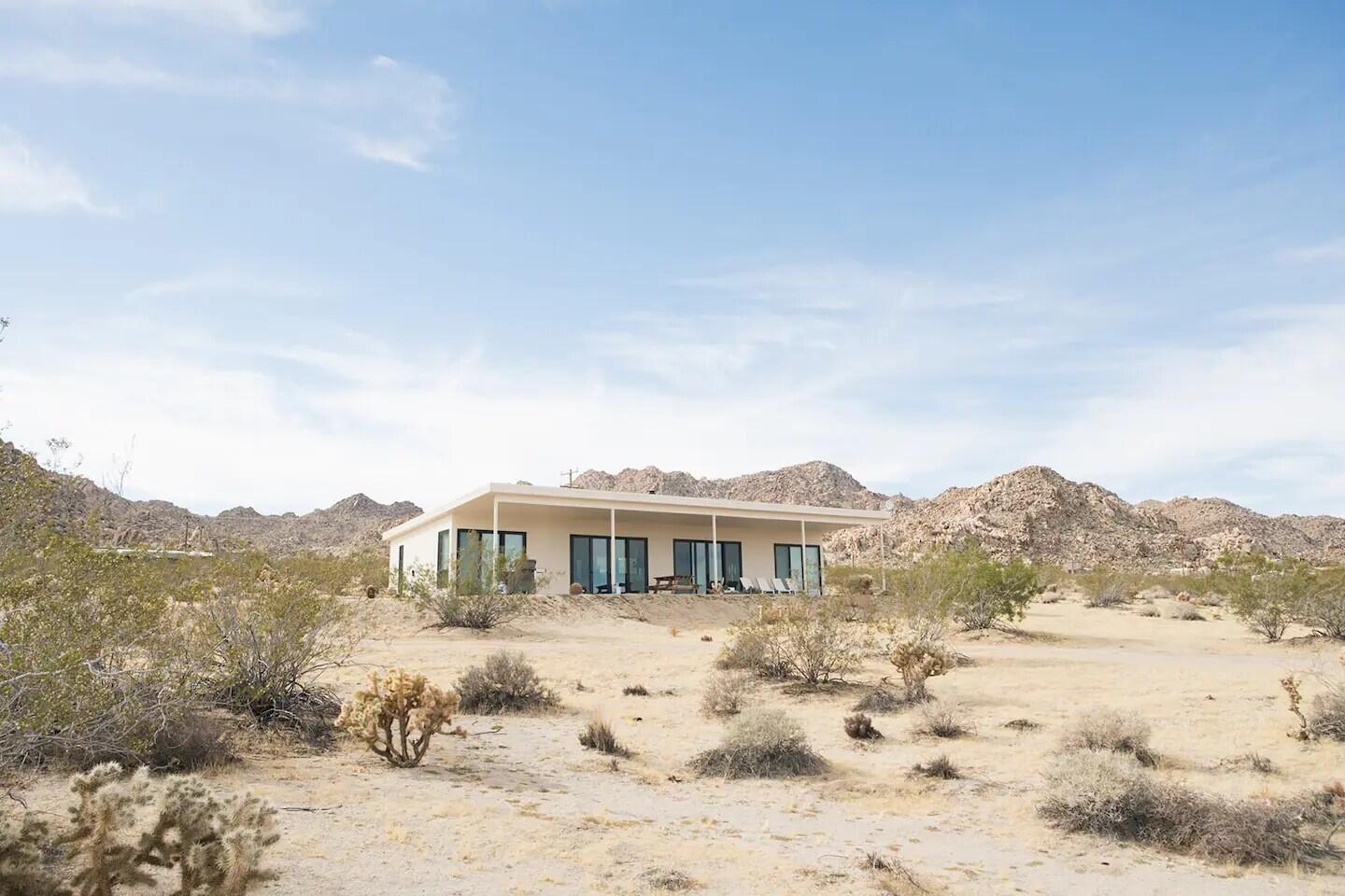 63730 Hollinger Road Joshua Tree, CA 92252 - Photo 5 of 31 a front view of a house with a yard