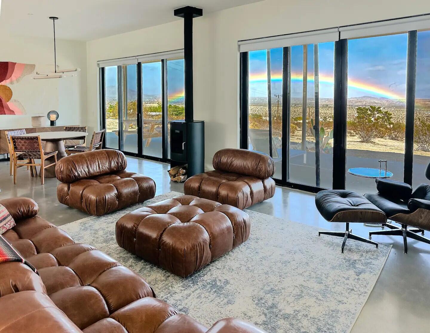 63730 Hollinger Road Joshua Tree, CA 92252 - Photo 7 of 31 a living room with furniture and floor to ceiling windows