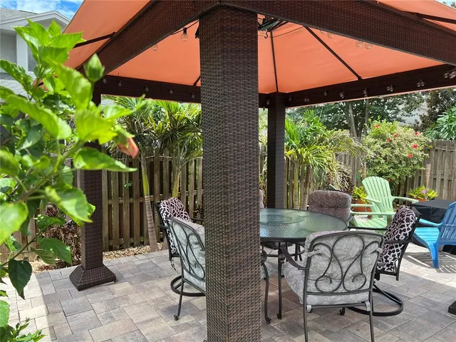 a view of a bathroom with a shower and a sink