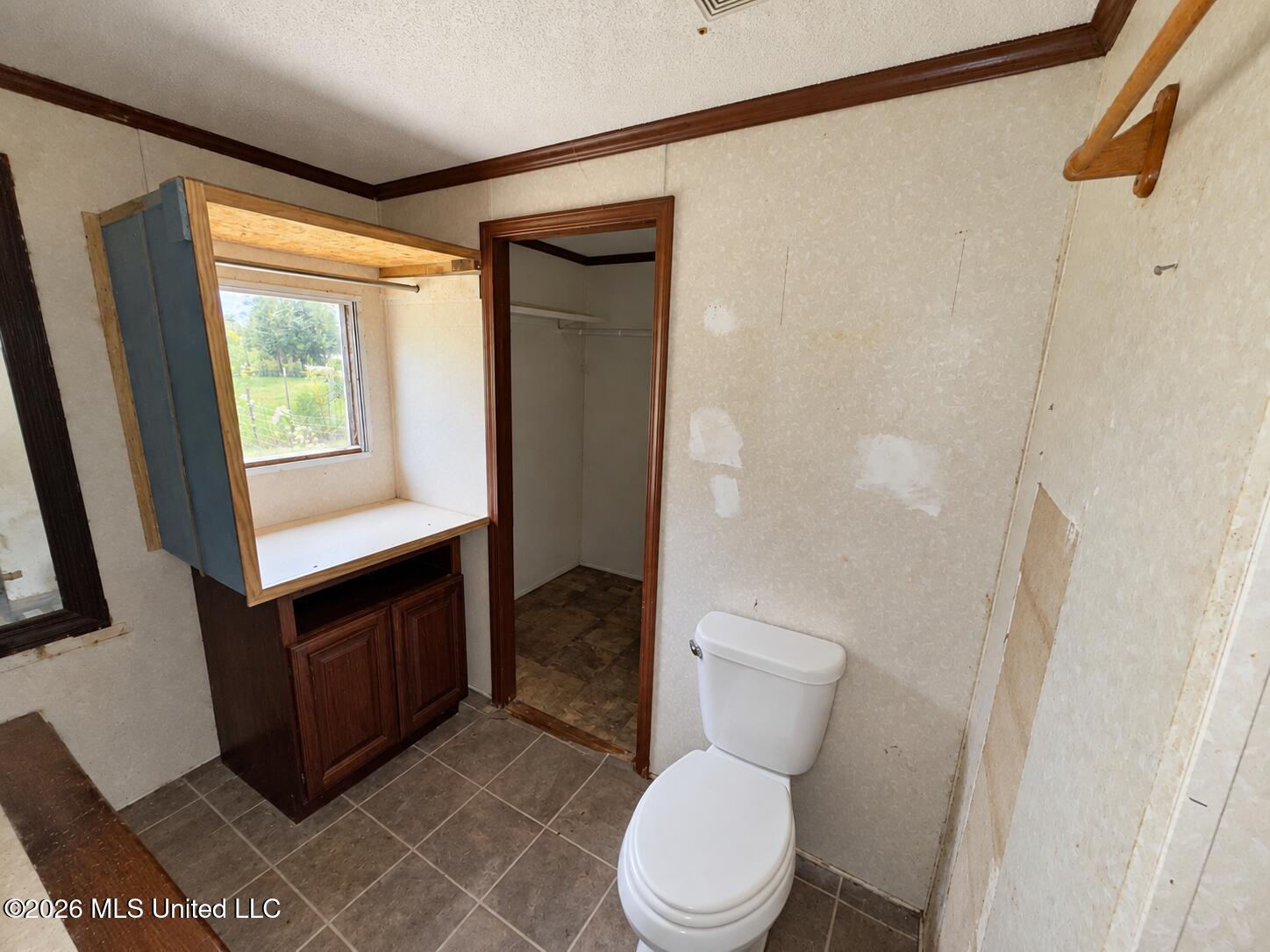 18206 Robinson Road Gulfport, MS 39503 - Photo 9 of 12 Natural-light bathroom with built-in cab