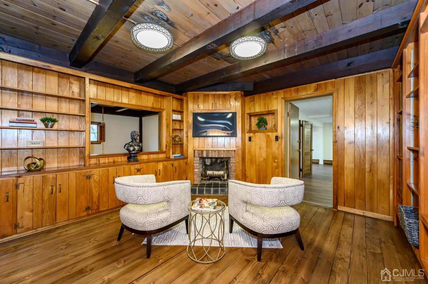 34 Mt Horeb Road Warren, NJ 07059 - Photo 11 of 55 a living room with furniture and a wooden floor