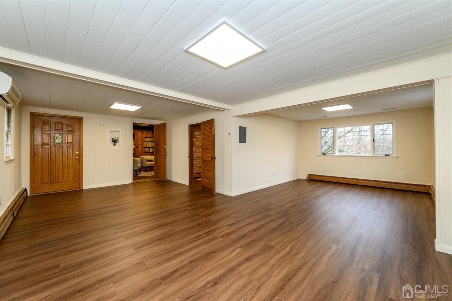 34 Mt Horeb Road Warren, NJ 07059 - Photo 14 of 55 an empty room with wooden floor and windows