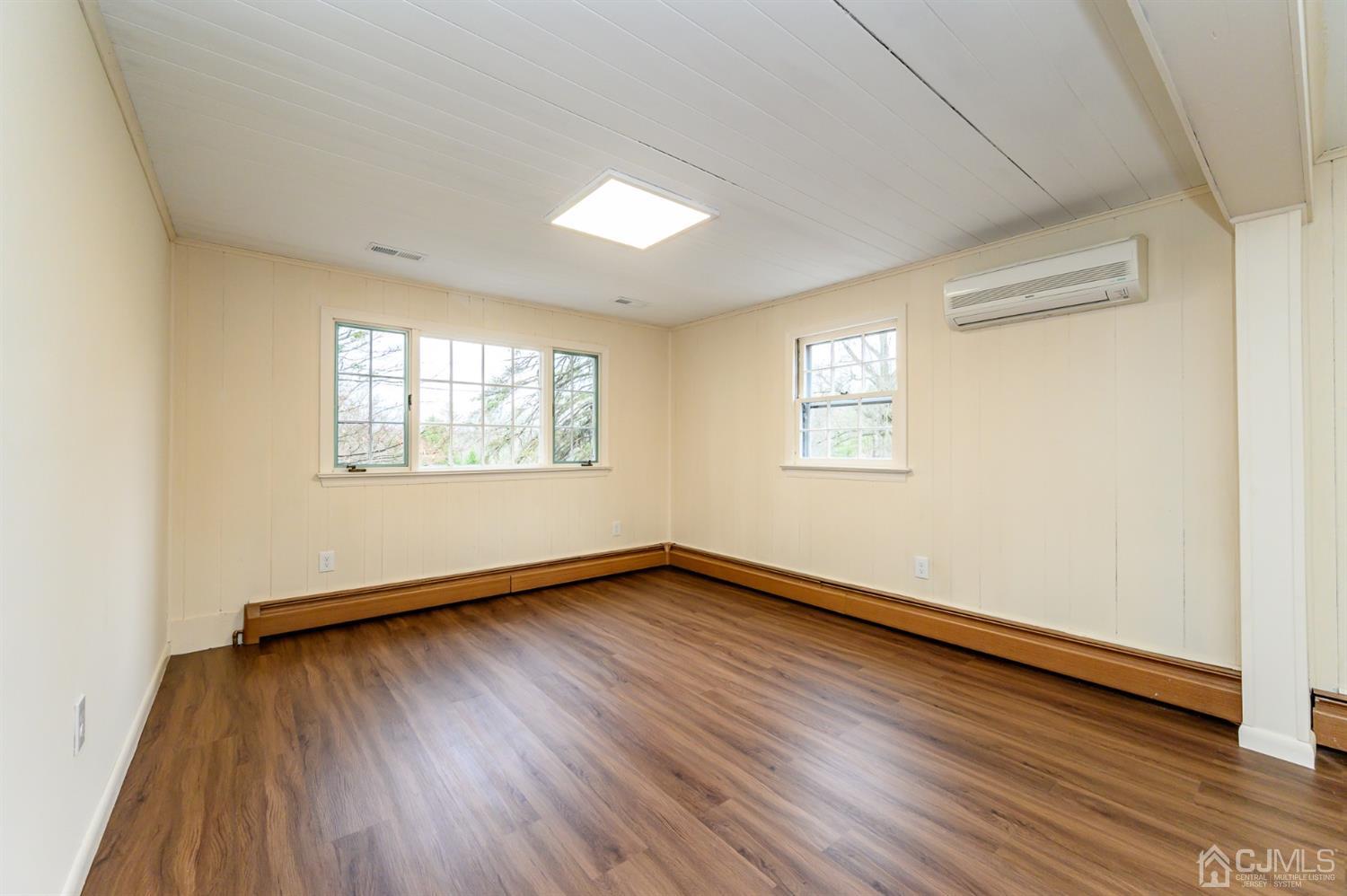 34 Mt Horeb Road Warren, NJ 07059 - Photo 15 of 55 an empty room with wooden floor and windows