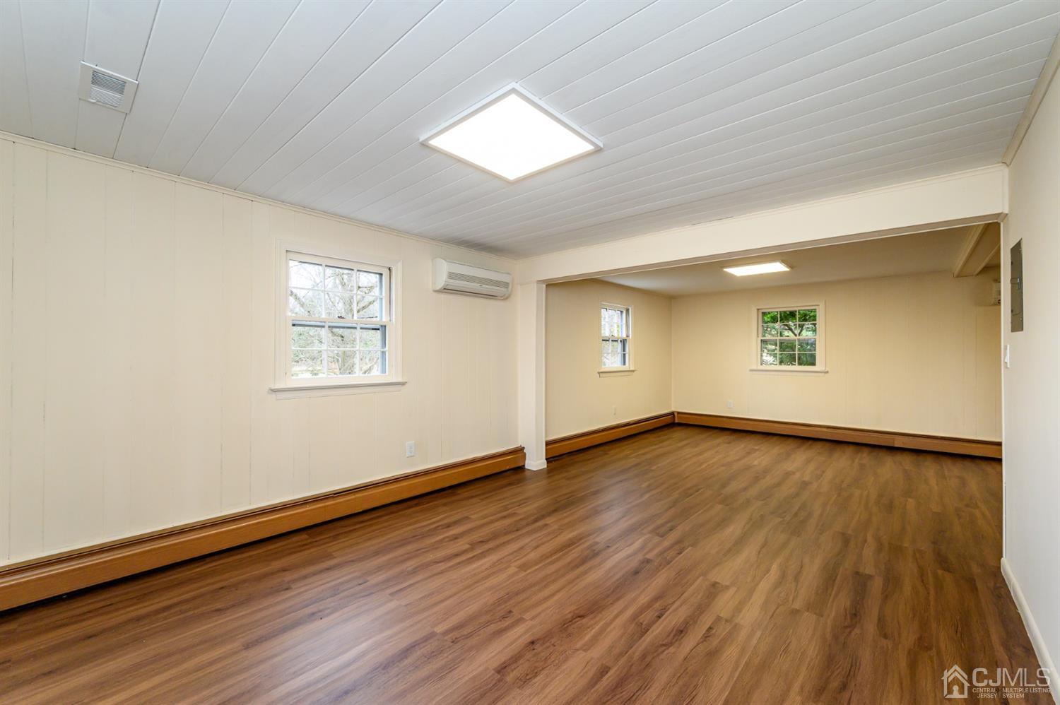 34 Mt Horeb Road Warren, NJ 07059 - Photo 16 of 55 an empty room with wooden floor and windows