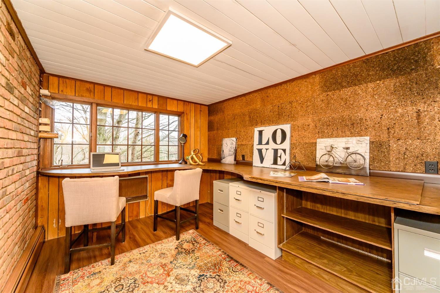 34 Mt Horeb Road Warren, NJ 07059 - Photo 17 of 55 a view of a center island with furniture and window