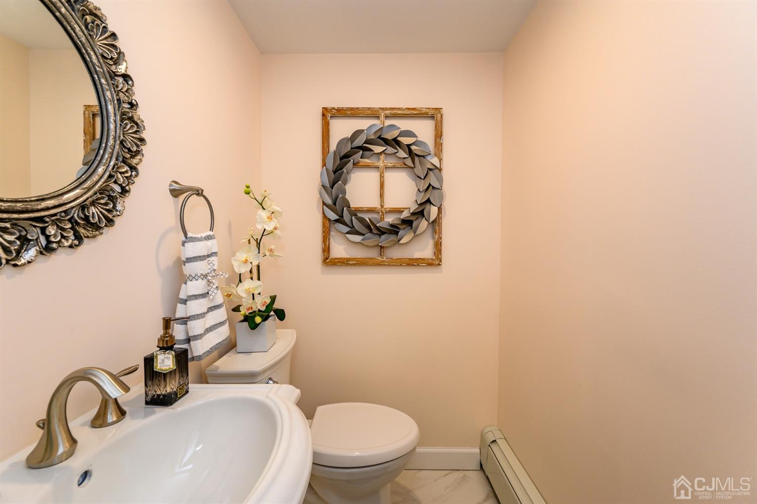 34 Mt Horeb Road Warren, NJ 07059 - Photo 18 of 55 a bathroom with a toilet mirror and a sink