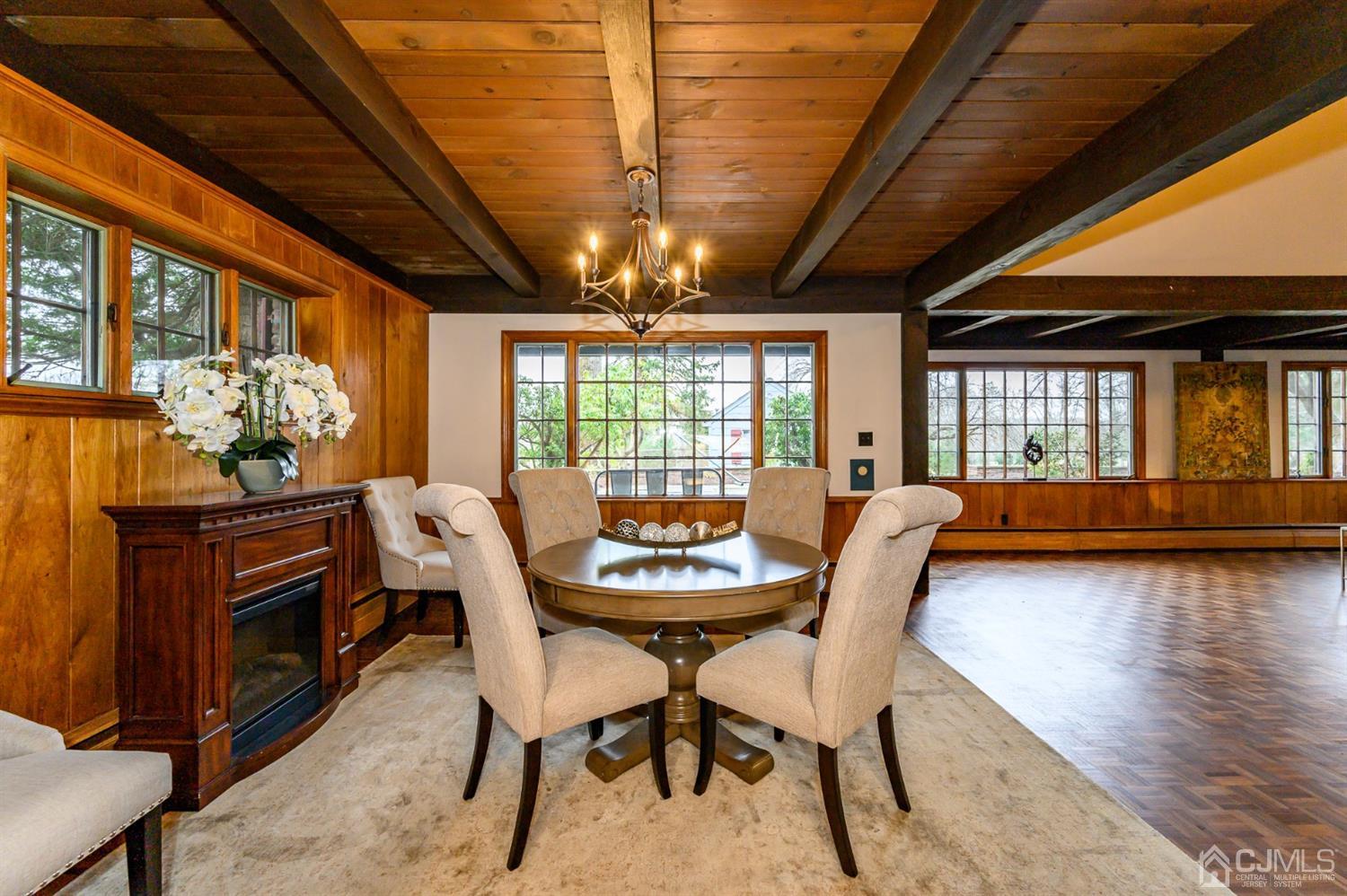 34 Mt Horeb Road Warren, NJ 07059 - Photo 28 of 55 a dining room with furniture a chandelier and wooden floor