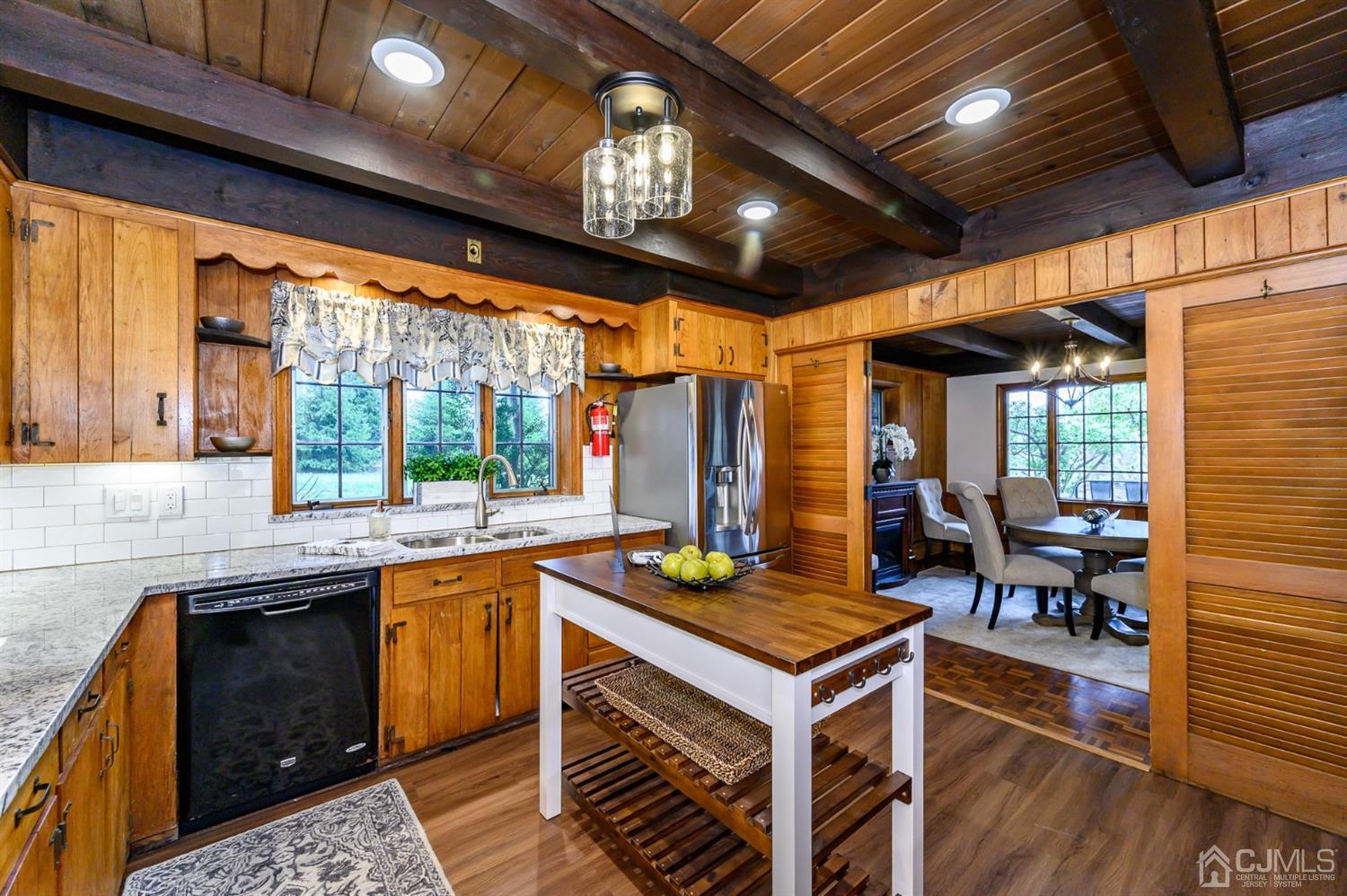 34 Mt Horeb Road Warren, NJ 07059 - Photo 31 of 55 a open kitchen with stainless steel appliances granite countertop a stove and a wooden floors
