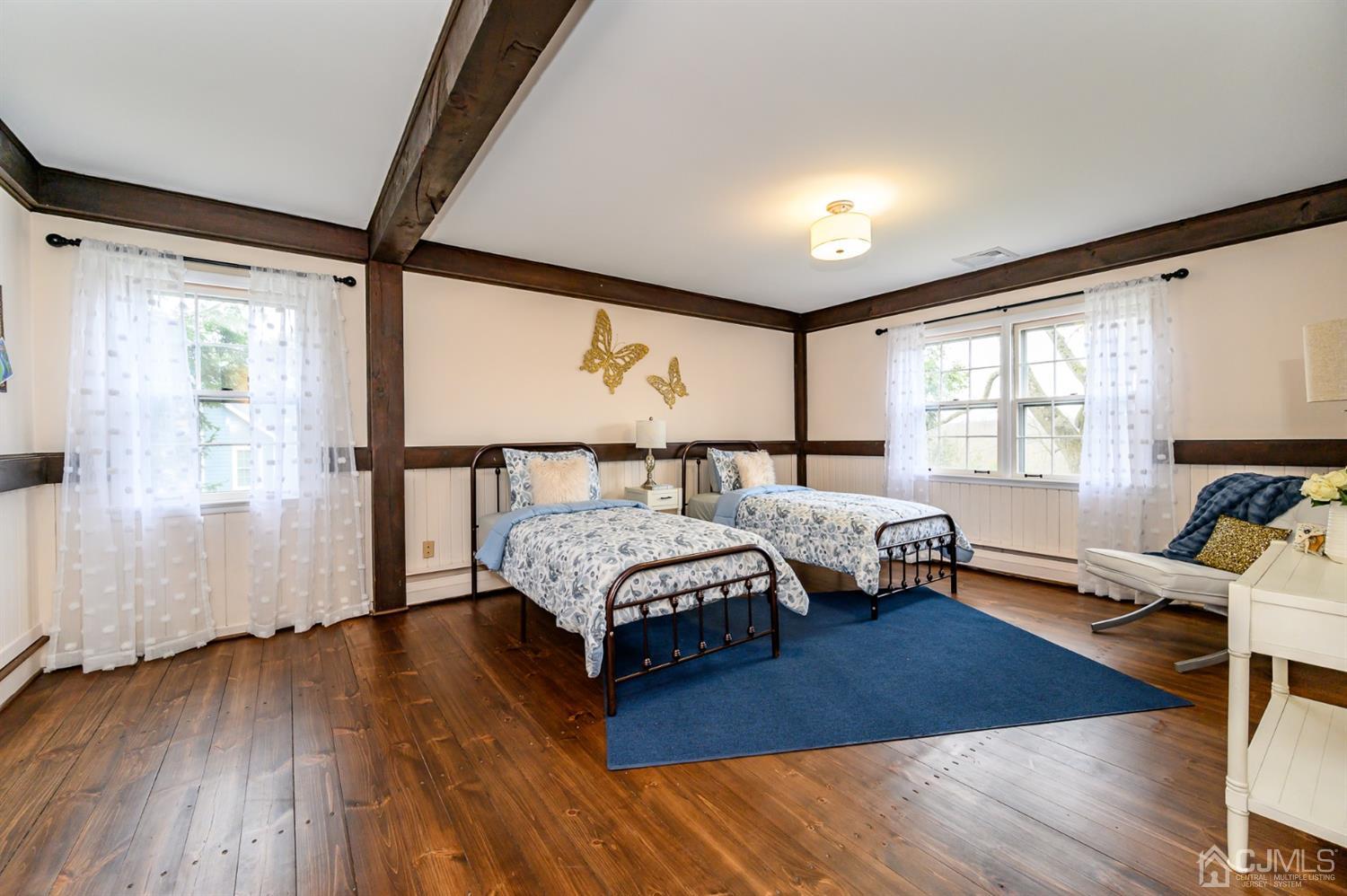 34 Mt Horeb Road Warren, NJ 07059 - Photo 34 of 55 a bedroom with a bed window and wooden floor