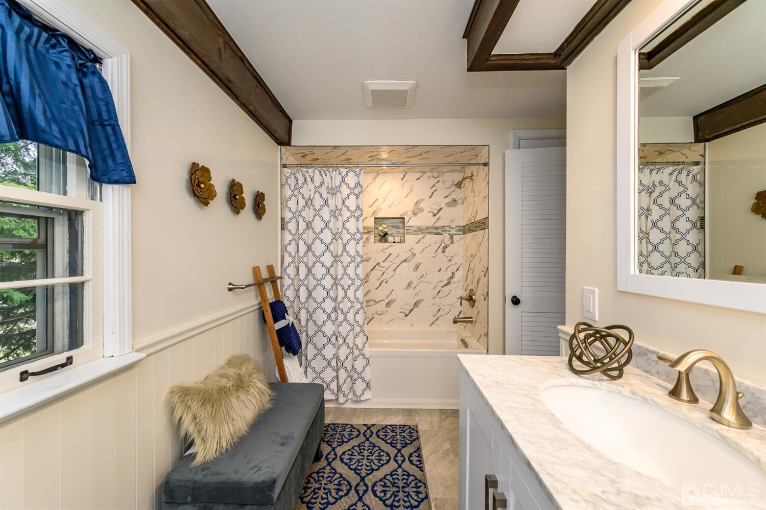 34 Mt Horeb Road Warren, NJ 07059 - Photo 36 of 55 a bathroom with a granite countertop sink a mirror and shower