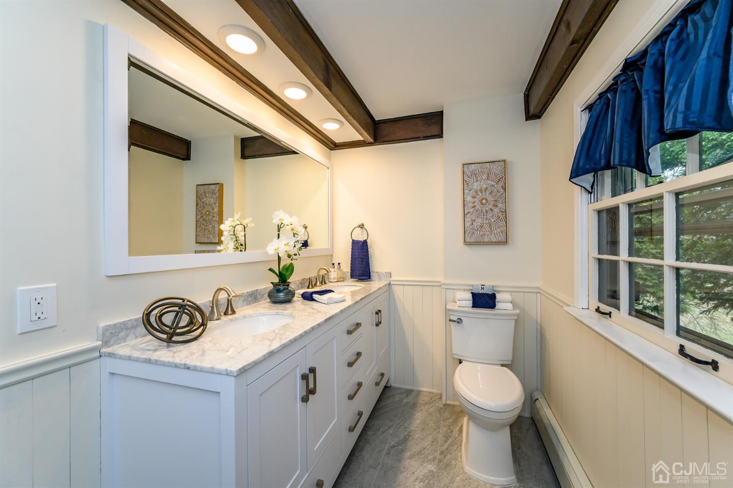 34 Mt Horeb Road Warren, NJ 07059 - Photo 37 of 55 a white toilet sitting next to a bathroom sink