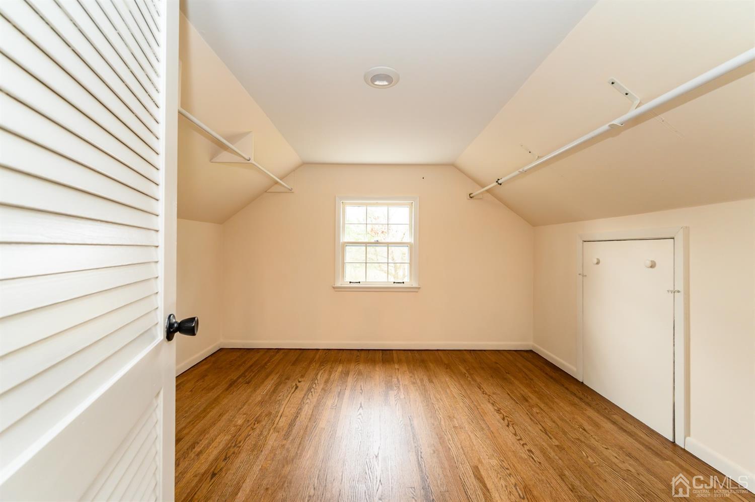 34 Mt Horeb Road Warren, NJ 07059 - Photo 46 of 55 an empty room with wooden floor and windows