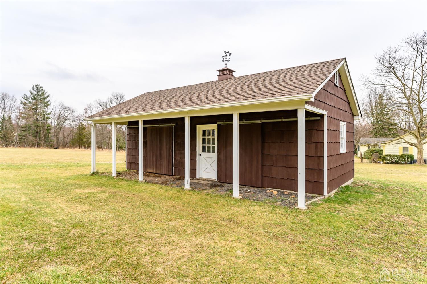 34 Mt Horeb Road Warren, NJ 07059 - Photo 51 of 55 a view of a house with wooden floor and a yard
