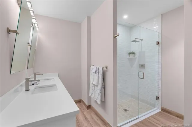 a room with a bed and a mirror