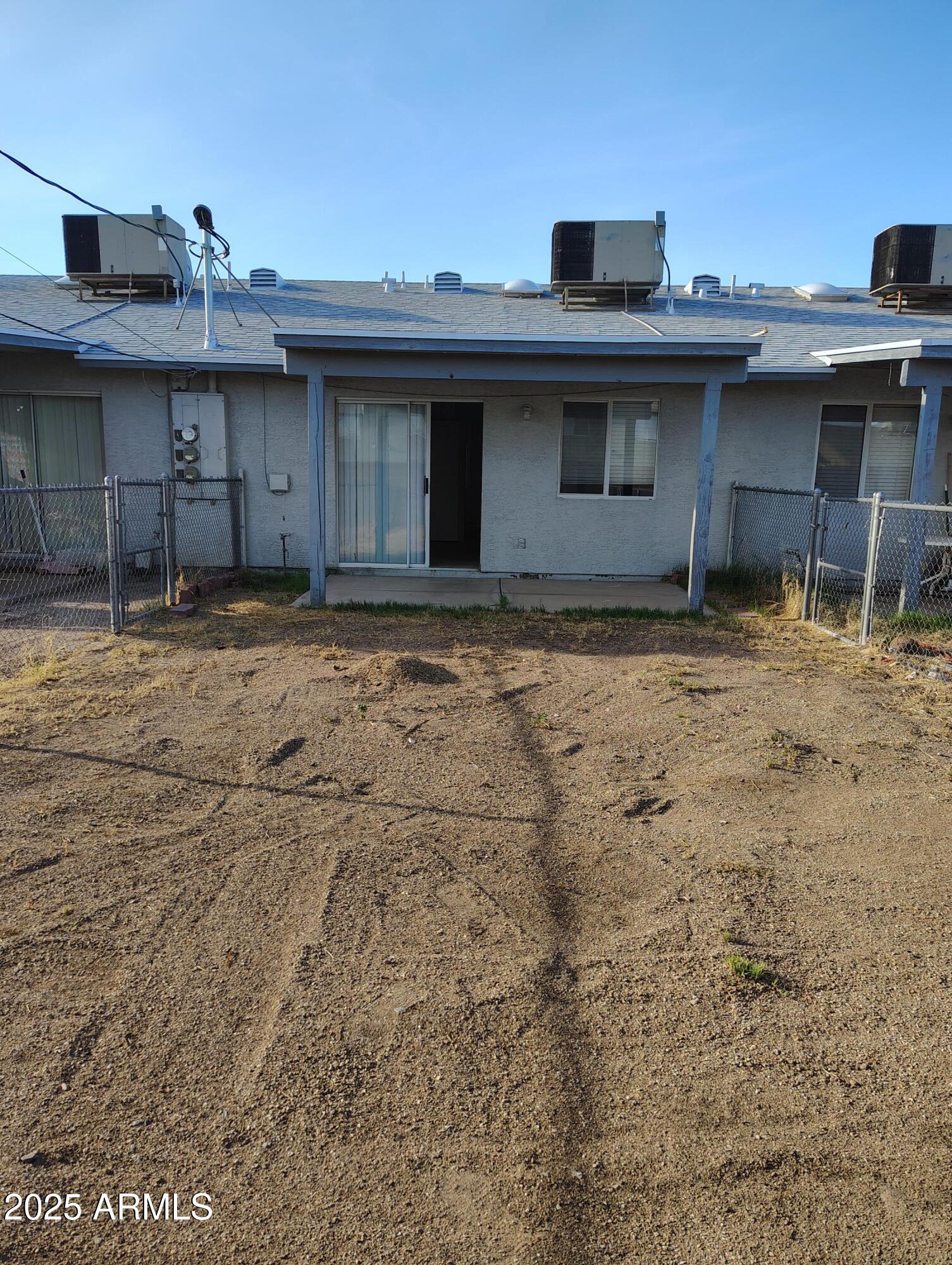 1471 East 27th Avenue, Unit 2 Apache Junction, AZ 85119 - Photo 16 of 16 a front view of a house with a space