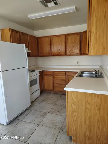 a utility room with washer and dryer