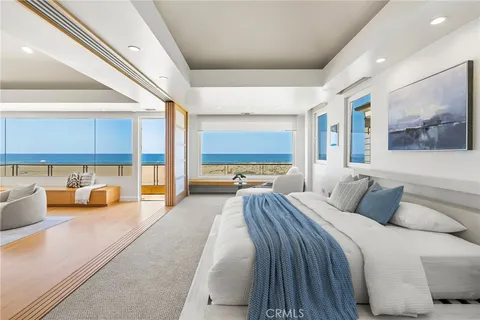 a living room with furniture potted plant and a fireplace